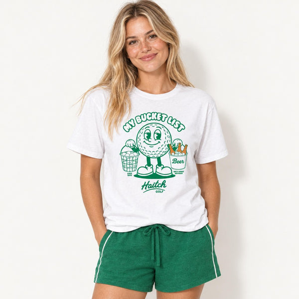 Woman wearing the Haitch Golf My Bucket List tee in White