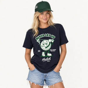 Woman wearing the Haitch Golf Never Lay Up tee in Navy