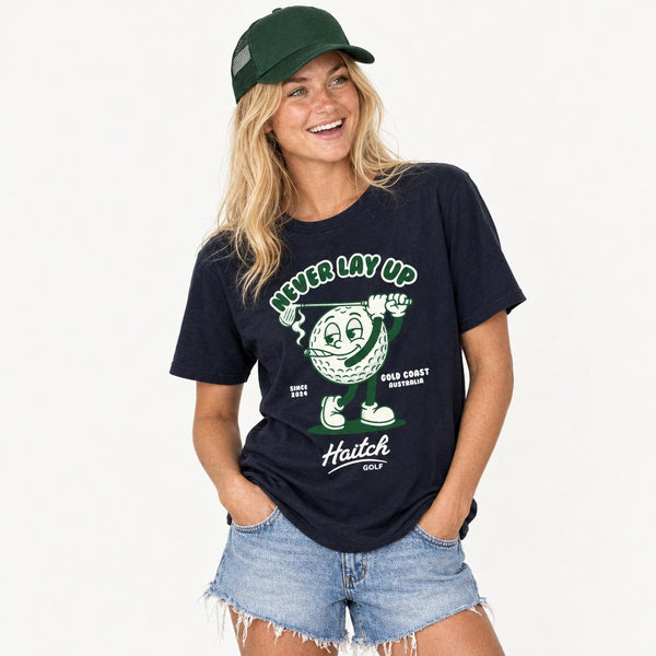 Woman wearing the Haitch Golf Never Lay Up tee in Navy, second view